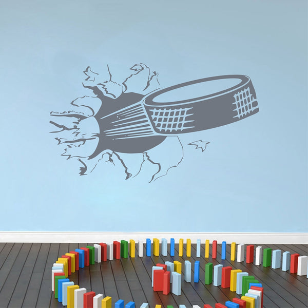 Sweet Hockey Puck Ripping Through Wall Decal